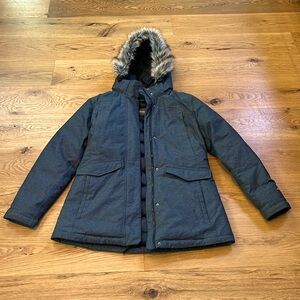 I’m selling a winter coat. It’s dark gray and black with a fluffy hood.